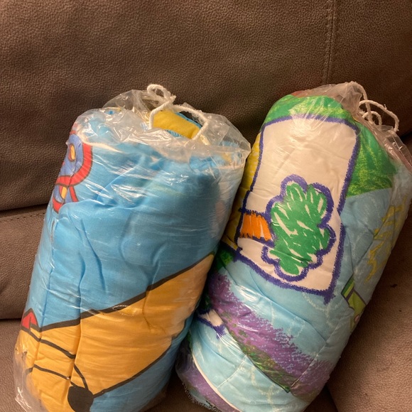 Vintage sleeping bags with Winnie The Poo and Elmo. - Picture 1 of 3